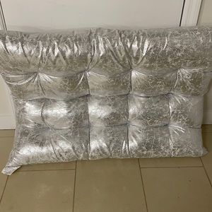 Silver headboard for college dorm bed.